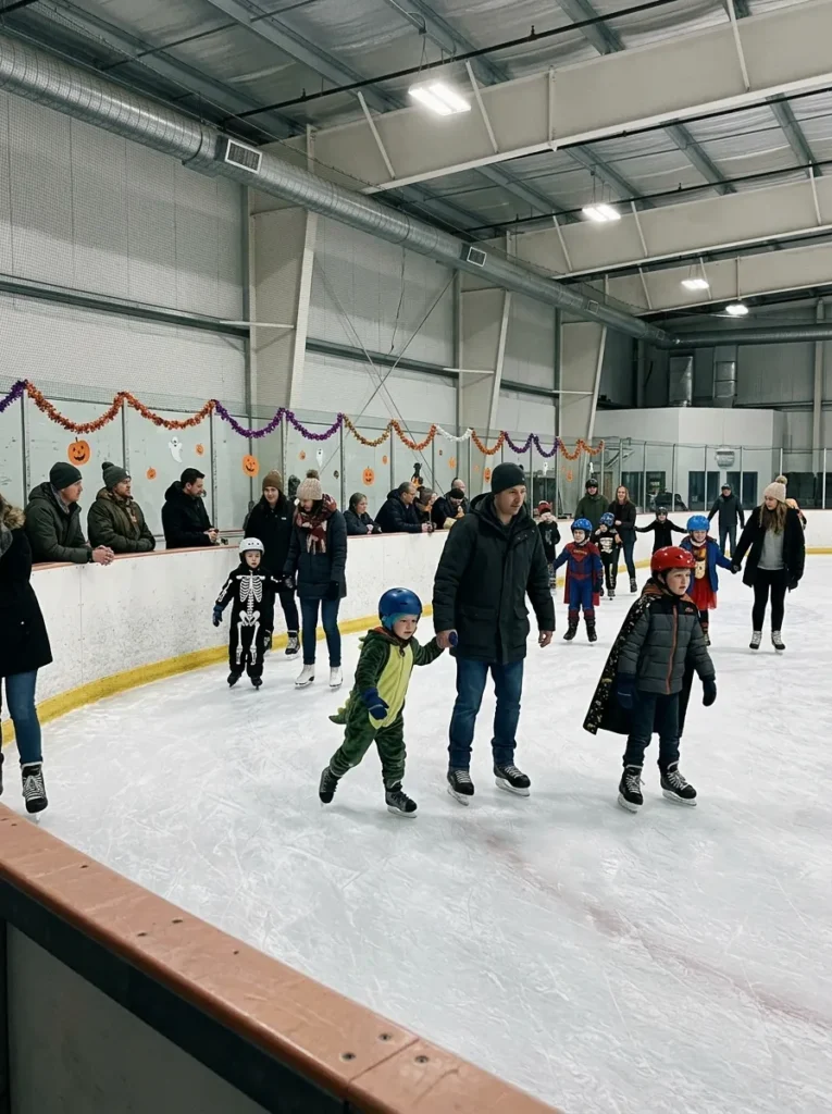 Community Ice Rink Spooky Skate on Ice - halloween events near me for kids (Indoor ice skating arena spooky skate session with colorful lighting)
